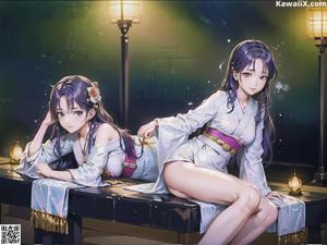 A couple of women sitting on top of a table.